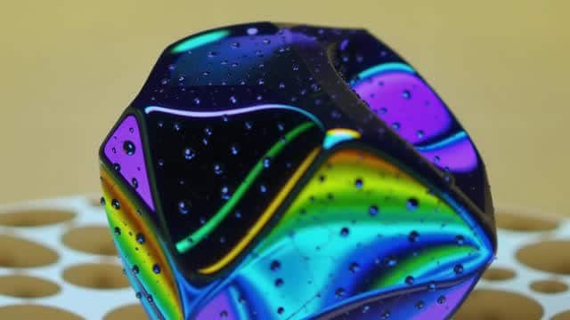 Shiny iridescent abstract polished geometric surface AI video preview