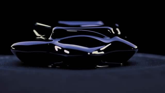 Sleek reflective dark automotive concept on studio set AI video preview