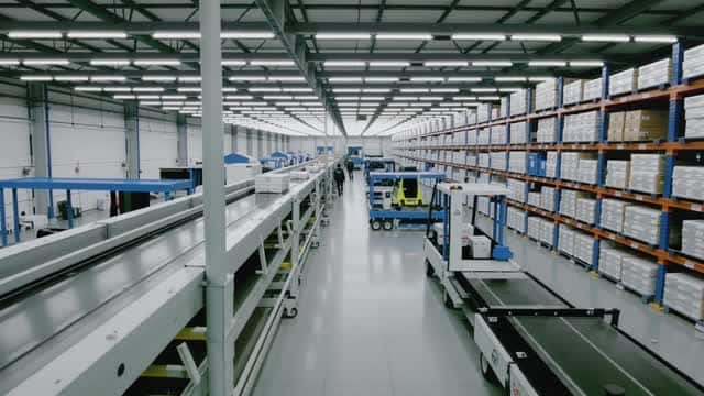 Modern automated warehouse facility logistics system AI video preview