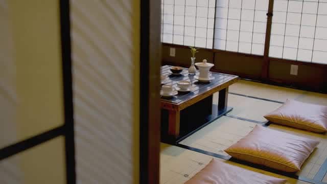 Peaceful Japanese interior setting with teaware on tatami mats AI video preview