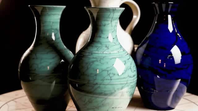 Decorative ceramic vase grouping for home decor still life AI video preview
