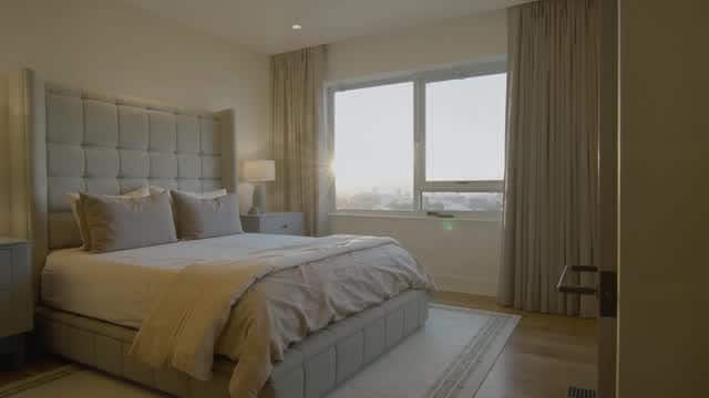Bright modern bedroom interior with natural daylight and view AI video preview