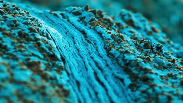 Macro detail of striking cyan natural mineral surface AI video preview