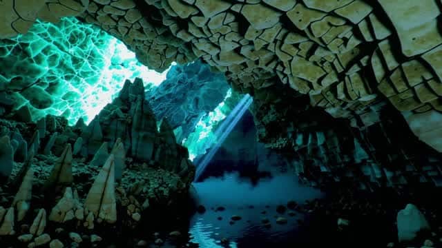 Deep sea cave interior dramatic light shafts AI video preview
