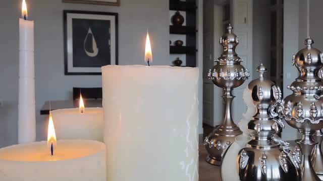 Elegant candles and antique metal decor centerpiece AI video preview